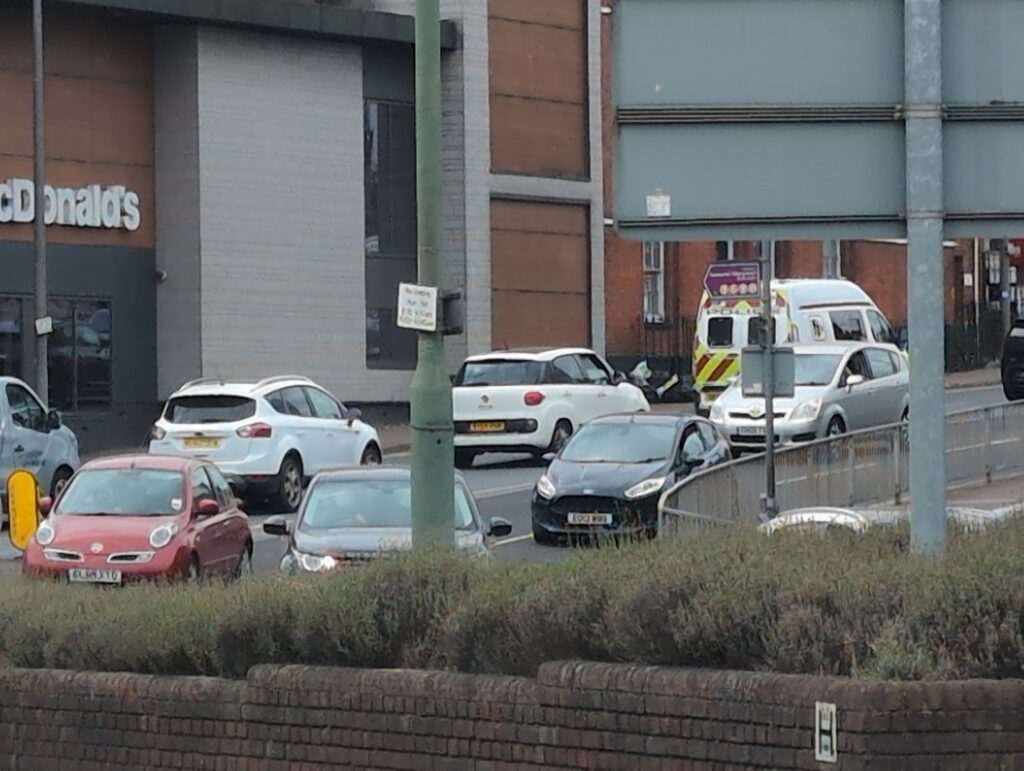 An enforcement van among parked cars -- what happened when one Driver blocked a camera van