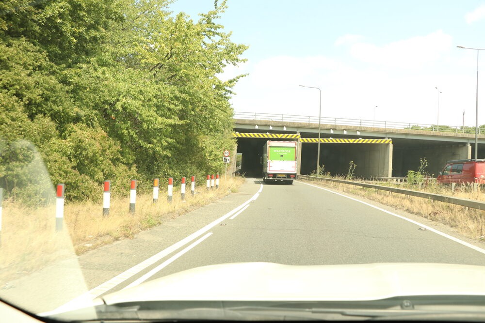A driver's view of an open road on a sunny day