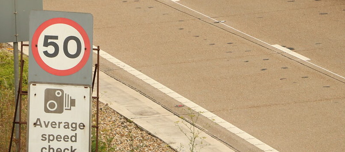Traffic ahead on a UK motorway -- how a mis-spaced number plate turns into a fine
