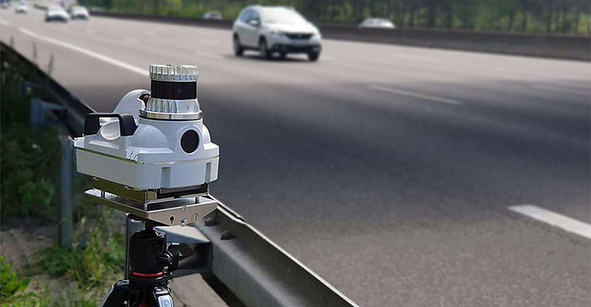 A tall grey pole with a compact rotating camera unit on top, like the 360-degree Parifex Nano