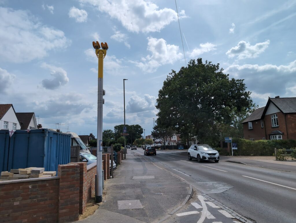 A roadside camera pole -- can a flashing speed indicator sign lead to a ticket?