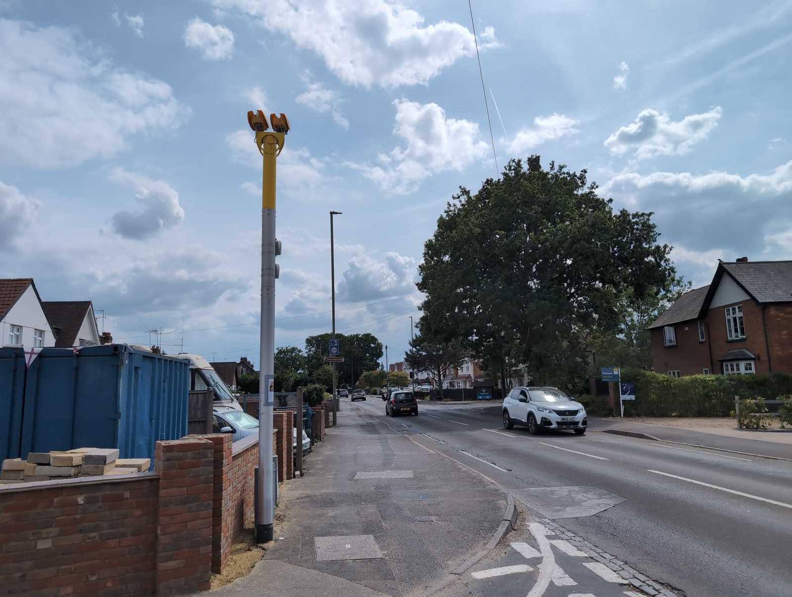 A roadside camera pole -- can a flashing speed indicator sign lead to a ticket?