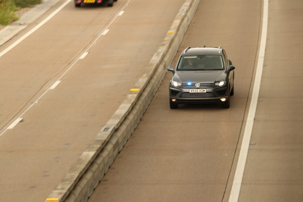 An unmarked traffic car at the roadside — one driver stopped at 107mph drove away without a ticket