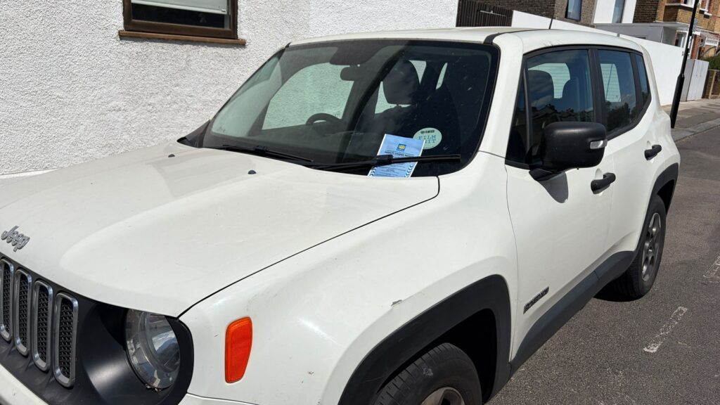 A ticketed car at the kerb -- clamping on private land has been banned for over a decade